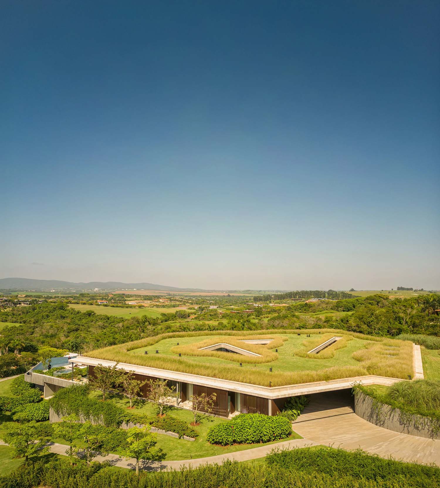 Bernardes Arquitetura,别墅设计,巴西,森林景观别墅,别墅设计案例,别墅设计方案,景观别墅,原木色,混凝土